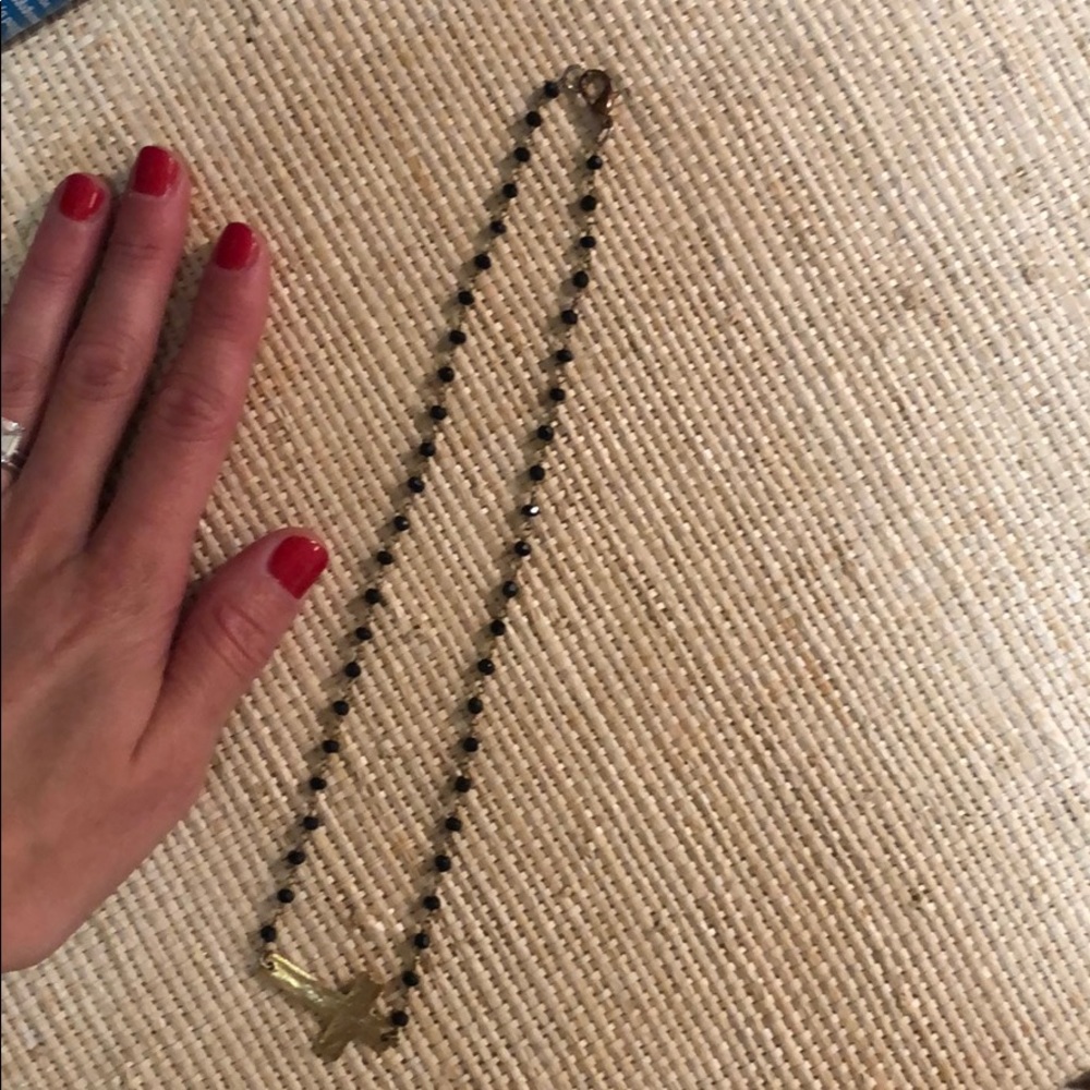 Brushed cross black gold color beaded necklace